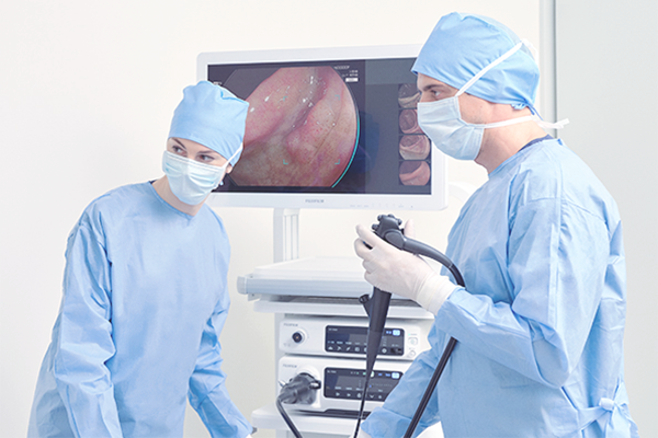 A doctor operating the endoscope